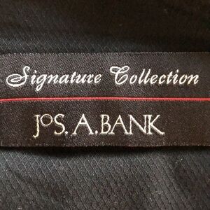 Men’s Jos. A. Bank Signature Collection olive dress slacks in 42/32.